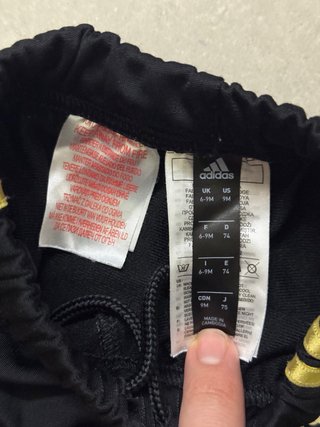 Tuta Adidas bimbi nera e oro