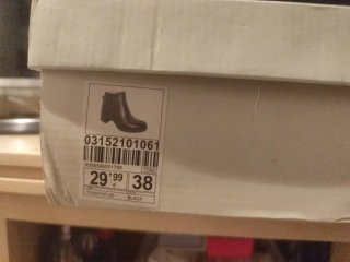 Botines negros con hebilla y cremallera
