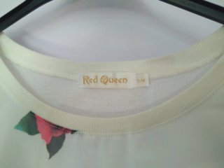 Blusa sin mangas con lazos y rosas