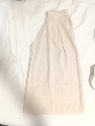 Pantalón culotte beige holgado con pinzas