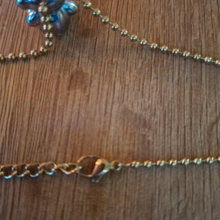 Conjunto osito dorado plateado de acero
