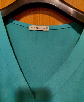 Blusa smanicata verde taglia unica