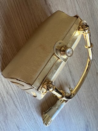 Bolso de mano fiesta rígido dorado