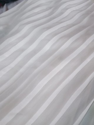 Abito bianco plissettato