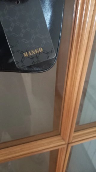 Bolso negro tachuelas Mango