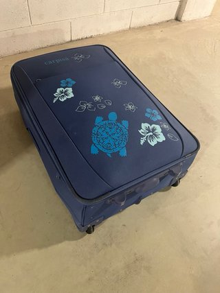 Valigia Carpisa blu con tartaruga e fiori