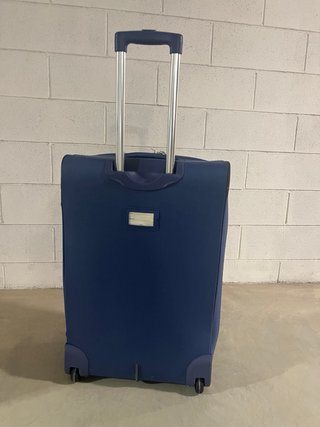 Valigia Carpisa blu con tartaruga e fiori
