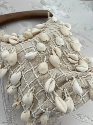 Bolso Zara conchas y asas de madera