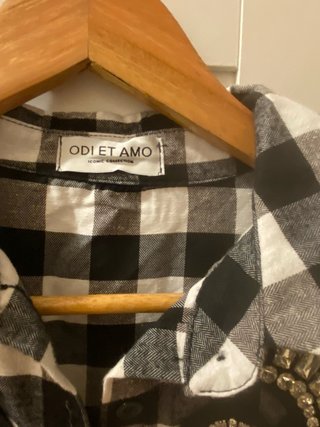 Abito quadri bianco e nero con decorazioni