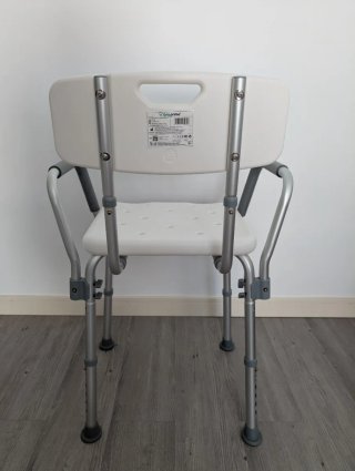 Silla de ducha con reposabrazos