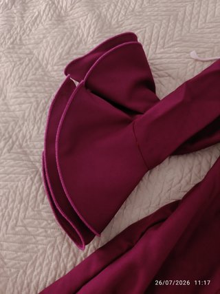 Traje de flamenca rosa y morado