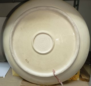 Piatto in ceramica decorato a mano