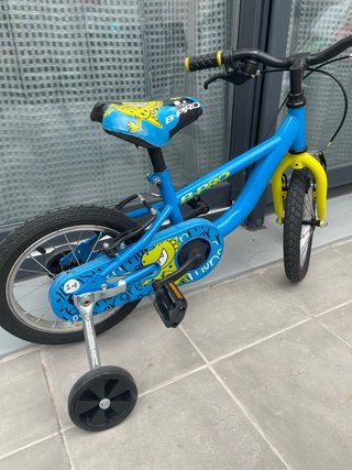 Bicicleta infantil azul y amarilla bh