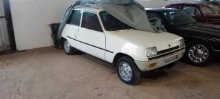 Lote de coches clásicos por mudanza