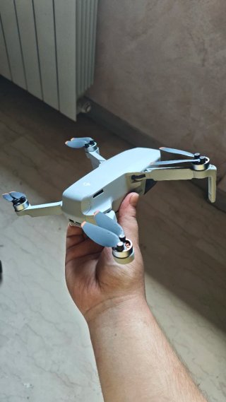 DJI Mini 4K Drone + Caricabatterie + SD 64GB