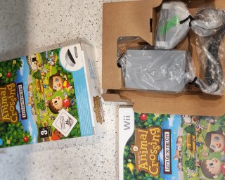 Animal Crossing: Let's Go to the City Wii y micro