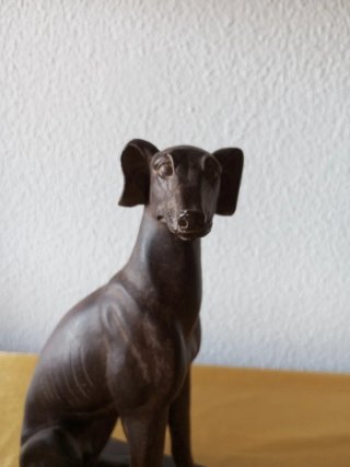 Eleganti supporti per libri con cani seduti
