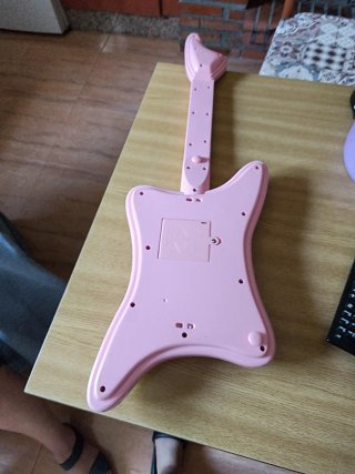 Guitarra de juguete rosa para niños