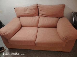 Sofá rosa de tela casi sin usar