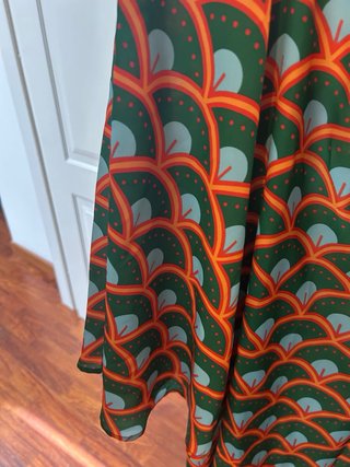 Abito ampio fantasia verde e arancio