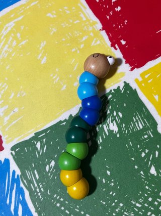 Oruga de madera para bebé