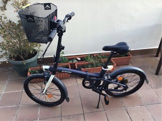 Bicicleta plegable Btwin con cesta
