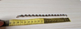 Braccialetto acciaio con strass celesti
