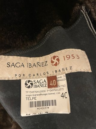 Elegante abrigo piel vuelta y cordero merino