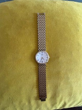 Reloj Citizen Quartz Dorado con Calendario