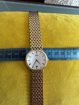 Reloj Citizen Quartz Dorado con Calendario