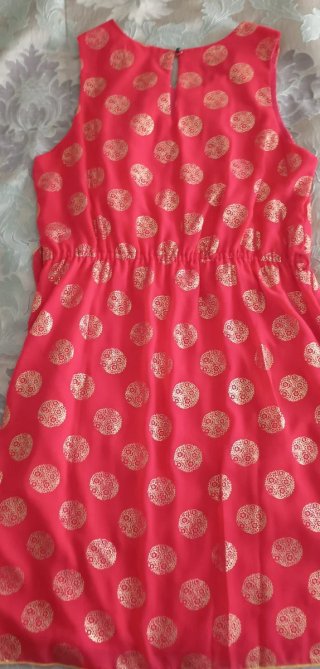 Vestido corto marca Flamenco coral con topos dorad