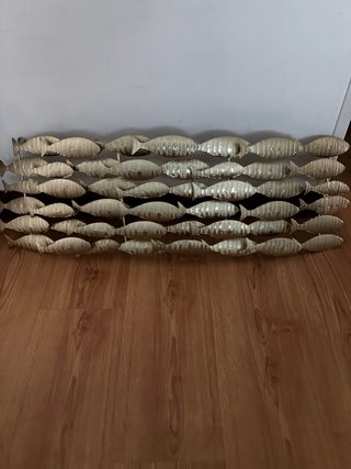 Decoración de pared de peces dorados