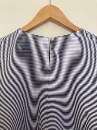 Vestito smanicato a trapezio
