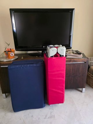 Cuna de viaje plegable roja