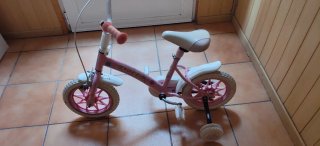 Bici niña rosa con ruedines