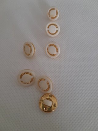 Juego botones abrigo/chaqueta negro y dorado
