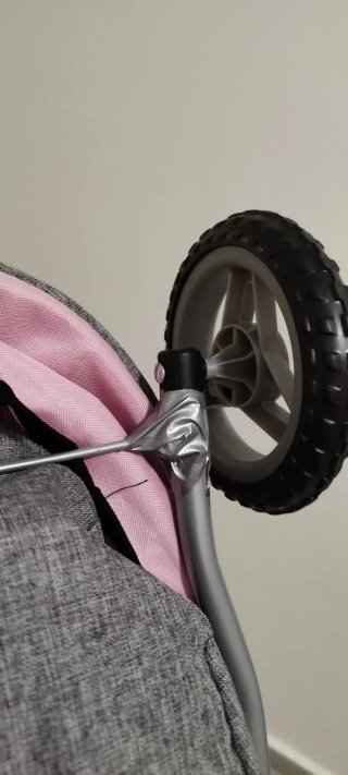Silla de paseo de juguete rosa y gris