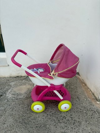 Carrito de juguete rosa lunares