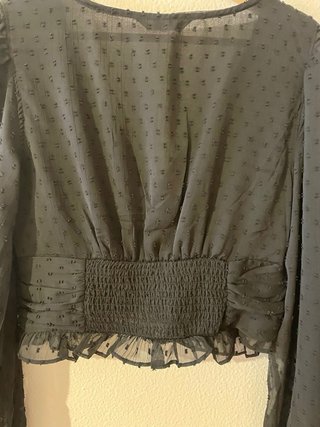 Blusa negra manga larga semitransparente