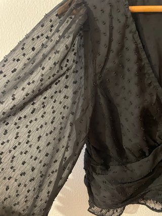 Blusa negra manga larga semitransparente