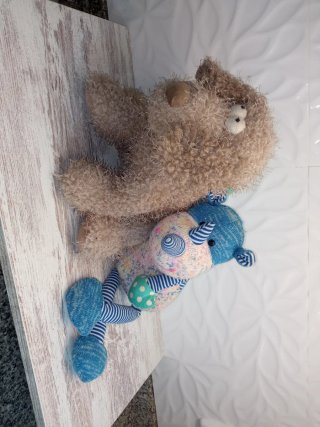 Lote peluches perro y rinoceronte bebé