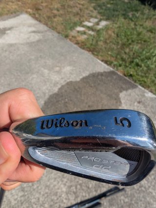 Palos de golf Wilson, Mizuno y St. Andrews