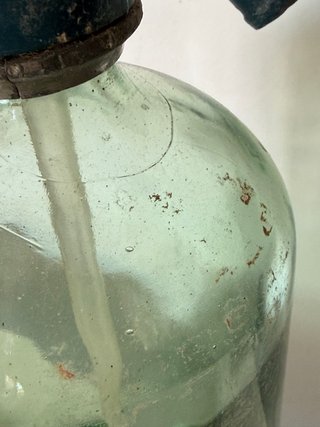 Sifón antiguo cabeza de plomo