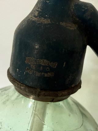 Sifón antiguo cabeza de plomo