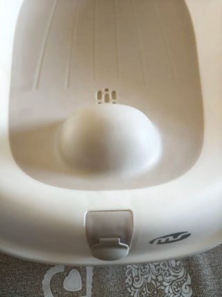 Silla de baño plegable para bebé Floppy (SIN USAR)