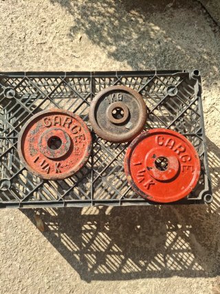 3 discos de hierro para pesas