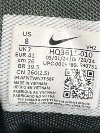Zapatillas Nike grises y blancas