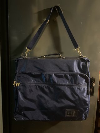 Porta traje  con neceser