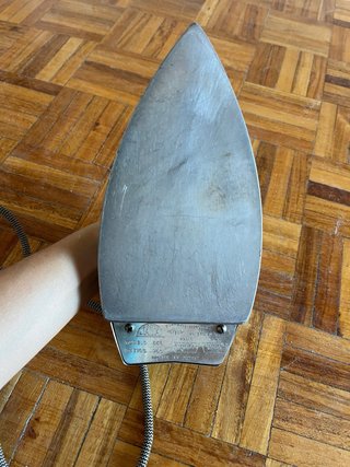 Plancha de ropa antigua