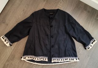 Chaqueta Zara con pompones